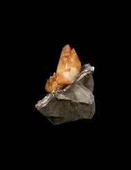 A CLUSTER OF LARGE ORANGE CALCITE CRYSTALS ON SPHALERITE A CLUSTER OF LARGE ORANGE CALCITE CRYSTALS ON SPHALERITE