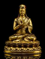 Fire gilt Bronze of a Saskyapa Lama Fire gilt Bronze of a Saskyapa Lama