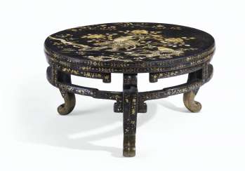A CHINESE LARGE BLACK LACQUER MOTHER-OF-PEARL INLAID ROUND T... A CHINESE LARGE BLACK LACQUER MOTHER-OF-PEARL INLAID ROUND T...
