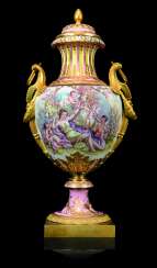 A FRENCH ORMOLU-MOUNTED SEVRES-STYLE PINK-GROUND VASE AND COVER A FRENCH ORMOLU-MOUNTED SEVRES-STYLE PINK-GROUND VASE AND COVER