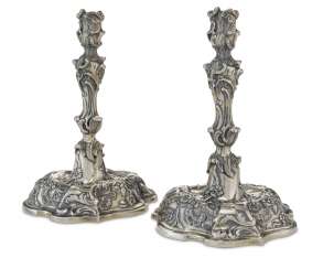 A PAIR OF GERMAN SILVER CANDLESTICKS A PAIR OF GERMAN SILVER CANDLESTICKS