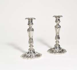 Pair of large silver candlesticks with finely open-worked foot Pair of large silver candlesticks with finely open-worked foot