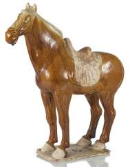 Brown-glazed Earthenware model of a standing horse Brown-glazed Earthenware model of a standing horse
