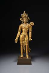 AN IMPORTANT GILT-COPPER FIGURE OF PADMAPANI LOKESHVARA AN IMPORTANT GILT-COPPER FIGURE OF PADMAPANI LOKESHVARA