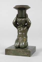Bronze chandelier a kneeling Putto Bronze chandelier a kneeling Putto
