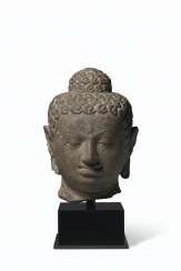 AN ANDESITE HEAD OF BUDDHA AN ANDESITE HEAD OF BUDDHA