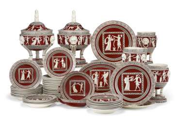 AN ITALIAN PEARLWARE IRON RED-GROUND PART DINNER SERVICE AN ITALIAN PEARLWARE IRON RED-GROUND PART DINNER SERVICE