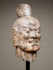BIGGER THAN LIFE-SIZE HEAD OF A GUARDIAN OF GOD BIGGER THAN LIFE-SIZE HEAD OF A GUARDIAN OF GOD