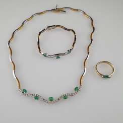 Gold jewelry set with emeralds and diamonds Gold jewelry set with emeralds and diamonds
