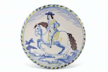 AN ENGLISH DELFT BLUE-DASH EQUESTRIAN PORTRAIT CHARGER AN ENGLISH DELFT BLUE-DASH EQUESTRIAN PORTRAIT CHARGER