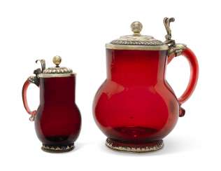 TWO GERMAN SILVER-GILT MOUNTED RUBY-GLASS TANKARDS TWO GERMAN SILVER-GILT MOUNTED RUBY-GLASS TANKARDS