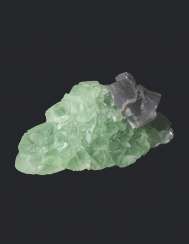 A SPECIMEN OF MINT GREEN AND GREY FLUORITE A SPECIMEN OF MINT GREEN AND GREY FLUORITE