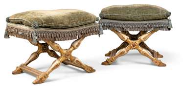 A PAIR OF NORTH ITALIAN WHITE-PAINTED AND PARCEL-GILT PLIANTS A PAIR OF NORTH ITALIAN WHITE-PAINTED AND PARCEL-GILT PLIANTS
