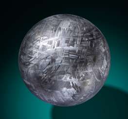 MUONIONALUSTA METEORITE CRYSTAL BALL — CRYSTALLINE STRUCTURE OF AN IRON METEORITE DRAMATIZED IN THREE DIMENSIONS MUONIONALUSTA METEORITE CRYSTAL BALL — CRYSTALLINE STRUCTURE OF AN IRON METEORITE DRAMATIZED IN THREE DIMENSIONS