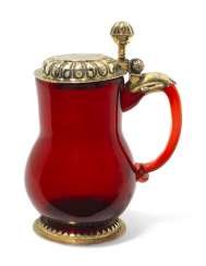 AN AUSTRO-HUNGARIAN SILVER-GILT MOUNTED RUBY-GLASS TANKARD AN AUSTRO-HUNGARIAN SILVER-GILT MOUNTED RUBY-GLASS TANKARD