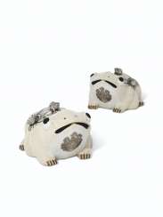 A PAIR OF CHINESE WHITE-METAL MOUNTED WHITE-GLAZED CERAMIC 'TOAD' INCENSE BURNERS A PAIR OF CHINESE WHITE-METAL MOUNTED WHITE-GLAZED CERAMIC 'TOAD' INCENSE BURNERS