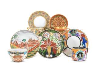 A PORCELAIN CUP AND SAUCER, AND A SMALL PLATE A PORCELAIN CUP AND SAUCER, AND A SMALL PLATE