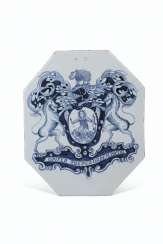A LONDON DELFT BLUE AND WHITE OCTAGONAL PILL-TILE A LONDON DELFT BLUE AND WHITE OCTAGONAL PILL-TILE