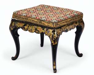 A NAPOLEON III BLACK, GILT AND POLYCHROME-DECORATED STOOL A NAPOLEON III BLACK, GILT AND POLYCHROME-DECORATED STOOL
