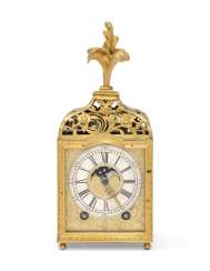 A LOUIS XVI ORMOLU AND ENGRAVED GILT-BRASS GRANDE AND PETITE SONNERIE TABLE CLOCK A LOUIS XVI ORMOLU AND ENGRAVED GILT-BRASS GRANDE AND PETITE SONNERIE TABLE CLOCK