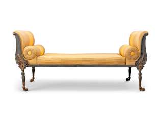 A NORTH EUROPEAN PARCEL-GILT CAST-IRON DAYBED A NORTH EUROPEAN PARCEL-GILT CAST-IRON DAYBED