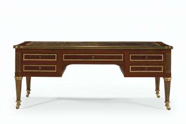 A LATE LOUIS XVI ORMOLU-MOUNTED PLUM-PUDDING MAHOGANY AND MA... A LATE LOUIS XVI ORMOLU-MOUNTED PLUM-PUDDING MAHOGANY AND MA...
