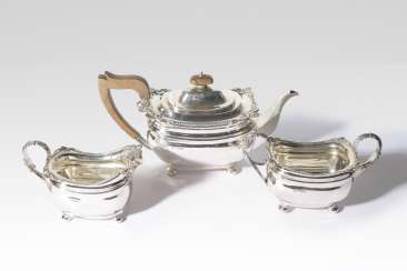 Elegant silver-Service, a teapot, a sugar bowl and a milk pot Elegant silver-Service, a teapot, a sugar bowl and a milk pot