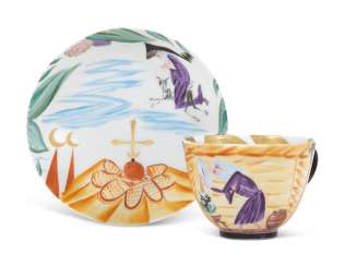 A SOVIET PORCELAIN CUP AND SAUCER A SOVIET PORCELAIN CUP AND SAUCER