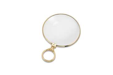 A GOLD MAGNIFYING GLASS A GOLD MAGNIFYING GLASS