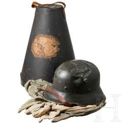 A parade helmet, five helmet covers and a helmet case A parade helmet, five helmet covers and a helmet case