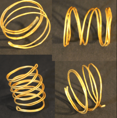 Four gold spiral bands, possibly bronze age Four gold spiral bands, possibly bronze age