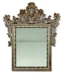 AN ITALIAN SILVERED MIRROR AN ITALIAN SILVERED MIRROR