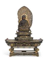 A CARVED SEATED WOOD FIGURE OF AMITABHA (AMIDA NYORAI) A CARVED SEATED WOOD FIGURE OF AMITABHA (AMIDA NYORAI)