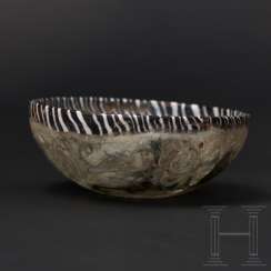 Glass bowl with floral decoration in a pigment layer between double walls, late Hellenistic - early Roman 1st century BC - 1st century AD Glass bowl with floral decoration in a pigment layer between double walls, late Hellenistic - early Roman 1st century BC - 1st century AD
