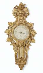 A LATE LOUIS XV GILTWOOD BAROMETER A LATE LOUIS XV GILTWOOD BAROMETER
