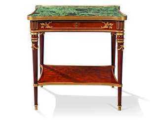 A FRENCH ORMOLU-MOUNTED MAHOGANY OCCASIONAL TABLE A FRENCH ORMOLU-MOUNTED MAHOGANY OCCASIONAL TABLE