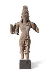 A RED SANDSTONE FIGURE OF VISHNU A RED SANDSTONE FIGURE OF VISHNU