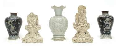 Three vases and two Blanc de Chine figures of Guanyin Three vases and two Blanc de Chine figures of Guanyin