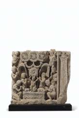 A GRAY SCHIST RELIEF DEPICTING THE ADORATION OF THE TRIRATNA... A GRAY SCHIST RELIEF DEPICTING THE ADORATION OF THE TRIRATNA...