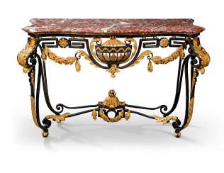 A LATE LOUIS XV GILT-TOLE AND WROUGHT IRON CONSOLE TABLE A LATE LOUIS XV GILT-TOLE AND WROUGHT IRON CONSOLE TABLE