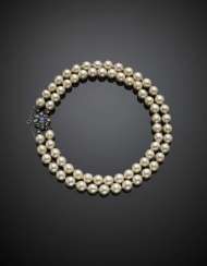 Two strand mm 9.50/10 circa cultured pearl necklace with silver and gold rose cut diamond and ct. 1.50 circa sapphire clasp Two strand mm 9.50/10 circa cultured pearl necklace with silver and gold rose cut diamond and ct. 1.50 circa sapphire clasp