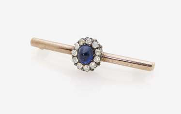 Two needles with diamonds and sapphire Two needles with diamonds and sapphire