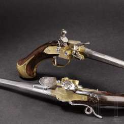 A Couple of rare self-loading flintlock pistols, Emanuel Wetschgin in Augsburg, Germany, around 1710 A Couple of rare self-loading flintlock pistols, Emanuel Wetschgin in Augsburg, Germany, around 1710