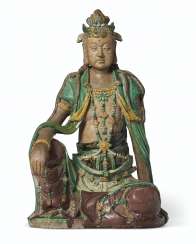 A LARGE GLAZED TILEWORKS FIGURE OF SEATED GUANYIN A LARGE GLAZED TILEWORKS FIGURE OF SEATED GUANYIN