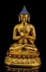 Fire-gilt Bronze of the Buddha Shakyamuni on a Lotus pedestal Fire-gilt Bronze of the Buddha Shakyamuni on a Lotus pedestal