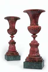 A PAIR OF RUSSIAN RHODONITE URNS A PAIR OF RUSSIAN RHODONITE URNS