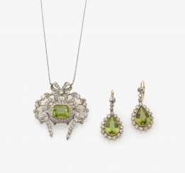 NECKLACE AND A PAIR OF DROP EARRINGS WITH PERIDOTEN AND DIAMONDS . Germany, around 1890 NECKLACE AND A PAIR OF DROP EARRINGS WITH PERIDOTEN AND DIAMONDS . Germany, around 1890