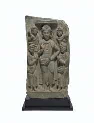 A RARE GREEN SCHIST RELIEF OF SIDDHARTHA WITH ADORANTS A RARE GREEN SCHIST RELIEF OF SIDDHARTHA WITH ADORANTS