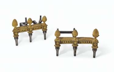 A PAIR OF LOUIS XVI ORMOLU AND STEEL CHENETS A PAIR OF LOUIS XVI ORMOLU AND STEEL CHENETS