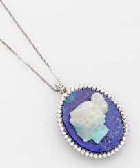 Opal cameo pendant with diamond trimming Opal cameo pendant with diamond trimming